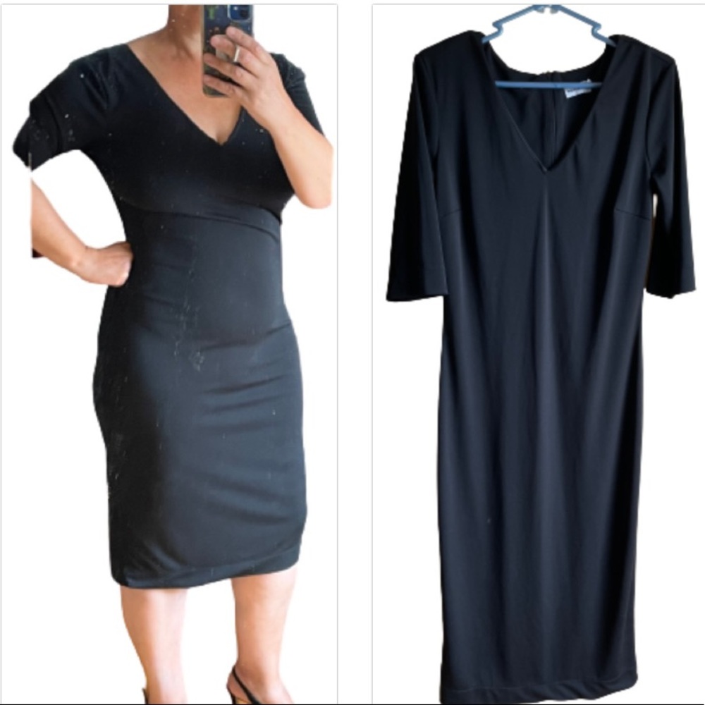 Black dress by Warehouse. NWOT pretty fit 3/4 sleeves Warehouse